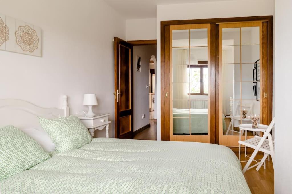 Casa De Las Flores - Apartamento Con Jardin Privado Frente A La Playa De Comillas Dış mekan fotoğraf