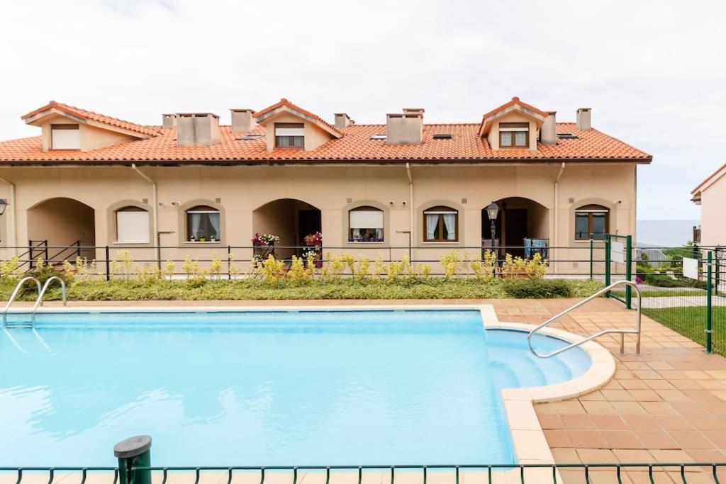 Casa De Las Flores - Apartamento Con Jardin Privado Frente A La Playa De Comillas Dış mekan fotoğraf